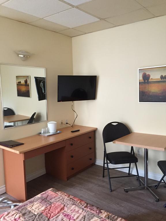 Motel Capri Et Suites Repentigny Szoba fotó